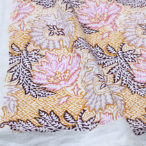 Multi Color Floral Indian Cotton Tablecloth with vibrant pink, purple, and mustard block print flowers and leaves on white, draped.