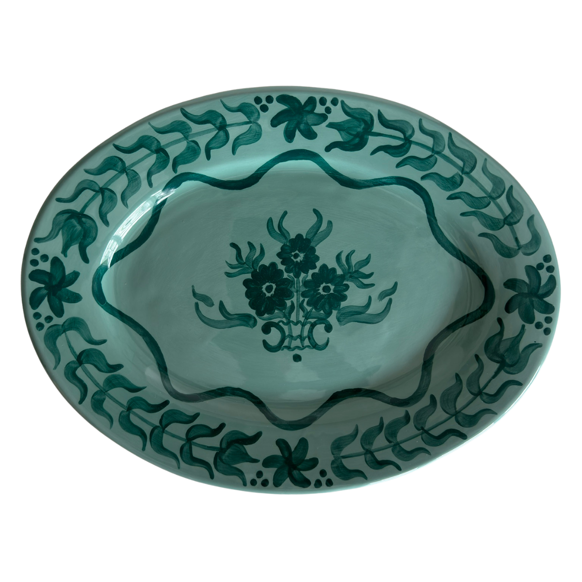 Teal Blossom Serving Platter, oval glazed ceramic platter with a light teal base and hand-painted dark teal floral and leaf motifs.