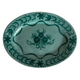 Teal Blossom Serving Platter, oval glazed ceramic platter with a light teal base and hand-painted dark teal floral and leaf motifs.