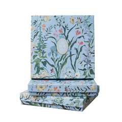 2026 Calendar in the Cornucopia Box and Easel, stacked rectangular boxes in light blue with dense colorful floral pattern.
