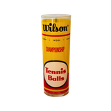Vintage Wilson Championship Glass, tall cylindrical clear glass with yellow label, black Wilson, red Championship, Tennis Balls text.