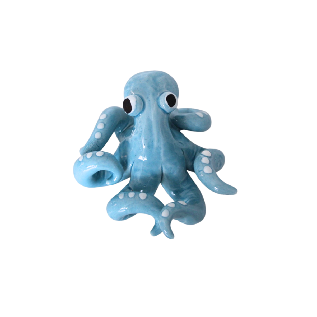 Light Blue Octopus Objet in glossy ceramic with white sucker details and expressive eyes on white background