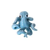 Light Blue Octopus Objet in glossy ceramic with white sucker details and expressive eyes on white background