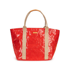 Giulia Glossy Tote Bag, a vibrant red textured washable paper tote with natural rope handles and brown leather grips.