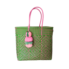 Sconset Woven Tote in Paradise Citron, a rectangular bag with vibrant green and hot pink interlocking woven pattern and a three-tiered tassel.