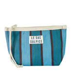 Paxos Everyday Pouch | Small, rectangular woven fabric with shades of blue and brown stripes, off-white drawstring, on white background.