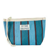 Paxos Everyday Pouch | Small, rectangular woven fabric with shades of blue and brown stripes, off-white drawstring, on white background.