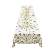 S&B x John Derian Wildflower Linen Tablecloth, white with vibrant multicolored symmetrical floral botanical print, rectangular and draped.