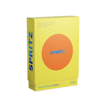 The Cocktail Cabinet: Spritz, a bright yellow paperboard slipcase with an orange circle and blue text, containing spritz recipes.