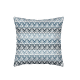 Ines Pillow, square decorative fabric pillow with repeating white botanical pattern on graduated blue horizontal bands.