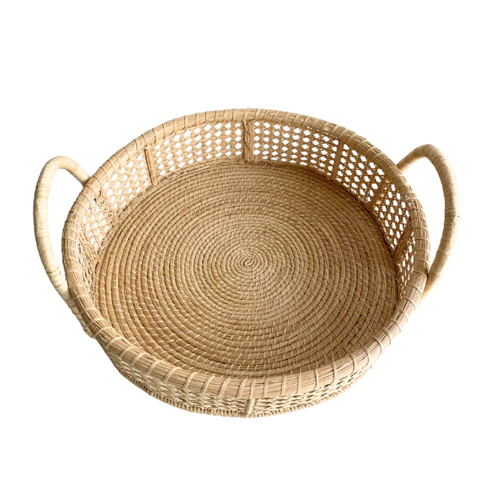 Iraca Fiber Round Tray with Caning, natural tan, featuring a spiral woven base and two handles, on a white background.