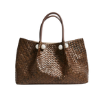 The Simone | Chocolate chocolate brown woven tote bag with brown leather handles and four white round decorative beads.