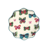Mariposa Paper Dinner Plate | Set of 12 with a scalloped edge, cream background, and colorful butterfly pattern, bordered by a teal rim.
