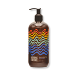 Mind and Body Wash in a dark brown plastic pump bottle with vibrant red, orange, yellow, green, and blue wavy lines, on white.