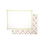 Lucy Stationery Set, a white notecard with a light green dotted border, overlapping an envelope with pink, yellow, and brown whimsical floral paper.