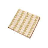 Elise Napkin in white cotton with orange stripes and green floral vine border, folded square shape