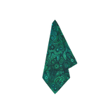 Malachite Linen Napkin in Emerald Green, a vibrant napkin with a swirling malachite ring pattern, folded.