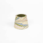 Hand Marbled Paper Lamp Shade for Cordless Lamp, conical, with cream, pastel green, blue, pink swirled pattern, and olive green inside.
