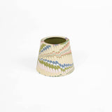 Hand Marbled Paper Lamp Shade for Cordless Lamp, conical, with cream, pastel green, blue, pink swirled pattern, and olive green inside.