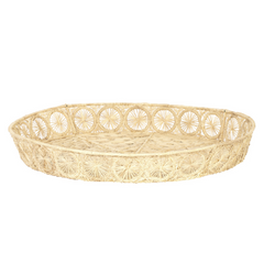 Woven Iraca Fiber Round Tray, a round natural beige shallow tray featuring a detailed sunburst pattern rim.